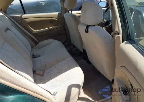 2001 Mitsubishi Mirage Es from USA, damaged, VIN JA3AY26CX1U041643